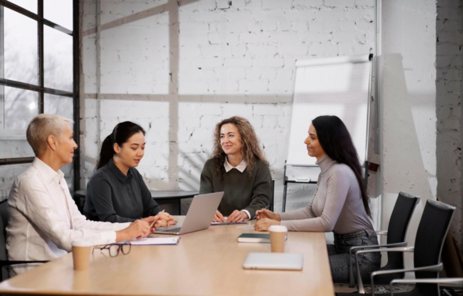 Students working collaboratively on financial modeling exercises in a modern learning environment